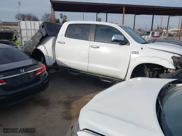 2013 Toyota Tundra 4WD Truck LTD with VIN 5TFHY5F17DX301113, listed as a IAAI auction lot 41669991 with NaN miles. Bid and sale history available at carsss.com. Image 14.