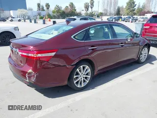 2015 Toyota Avalon Limited with VIN 4T1BK1EB8FU181008, listed as a IAAI auction lot 41850174 with 71,921 mi miles and . Bid and sale history available at DreamBid. Image 4.