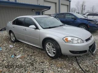 2014 Chevrolet Impala LTZ with VIN 2G1WC5E33E1166602, listed as a Copart auction lot 52108575 with 124,477 mi miles and Clean Title. Bid and sale history available at DreamBid. Image 4.