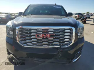 2019 GMC Yukon Denali with VIN 1GKS2CKJ9KR186604, listed as a Copart auction lot 82201124 with 110,069 mi miles and Salvage Title. Bid and sale history available at DreamBid. Image 5.