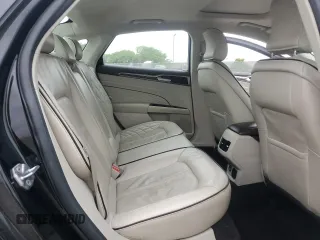2017 Ford Fusion Titanium z VIN 3FA6P0SU5HR105415, wystawiony jako Copart lot #59779715 z przebiegiem 88 988 mil mil oraz Szkoda całkowita • Salvage title. Historia ofert i sprzedaży dostępna na DreamBid. Obrazek 10.