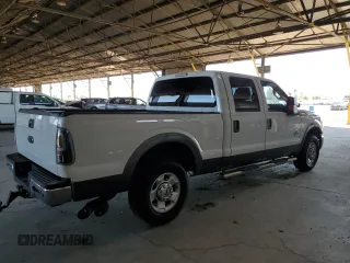 2011 Ford F-250 XL with VIN 1FT7W2AT2BEC57538, listed as a Copart auction lot 64505735 with 153,584 mi miles and Salvage title. Bid and sale history available at DreamBid. Image 3.