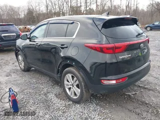 2018 Kia Sportage LX with VIN KNDPMCAC8J7447200, listed as a IAAI auction lot 40901708 with 121,418 mi miles. Bid and sale history available at carsss.com. Image 3.