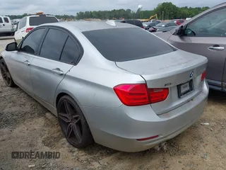 2014 BMW 3 Series 328i with VIN WBA3A5G52ENP31318, listed as a IAAI auction lot 42801411 with 149,355 mi miles and . Bid and sale history available at DreamBid. Image 3.