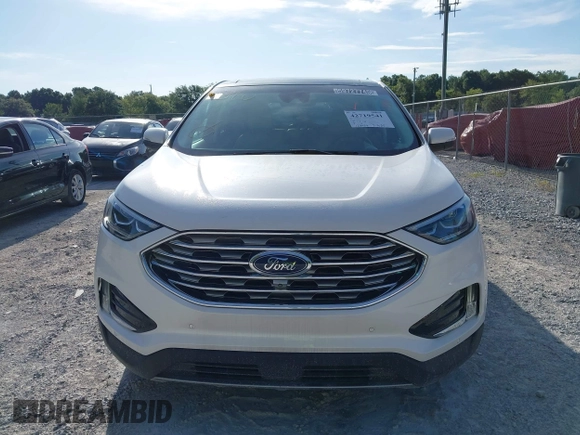 2019 Ford Edge Titanium with VIN 2FMPK3K95KBB34764, listed as a IAAI auction lot 42719541 with 128,028 mi miles and . Bid and sale history available at DreamBid. Image 12.