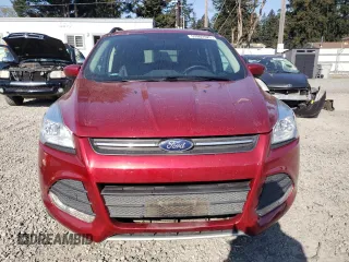 2016 Ford Escape SE with VIN 1FMCU9G91GUA85357, listed as a Copart auction lot 53902925 with 30,177 mi miles and Salvage Title. Bid and sale history available at DreamBid. Image 5.