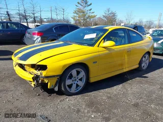 2004 Pontiac GTO with VIN 6G2VX12G54L245972, listed as a IAAI auction lot 41819699 with 77,198 mi miles. Bid and sale history available at carsss.com. Image 2.