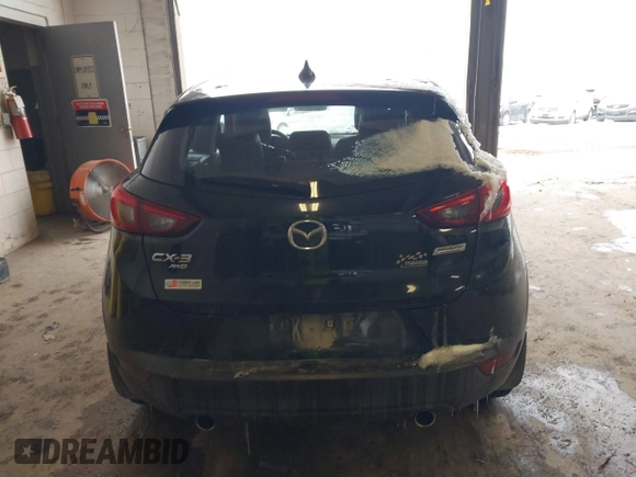 2016 Mazda CX-3 Grand Touring with VIN JM1DKFD71G0132801, listed as a IAAI auction lot 41573276 with 90,000 mi miles. Bid and sale history available at carsss.com. Image 16.
