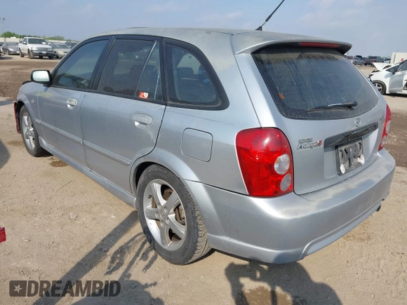 2003 Mazda Protege with VIN JM1BJ245031218333, listed as a IAAI auction lot 42070471 with 181,748 mi miles and . Bid and sale history available at DreamBid. Image 3.