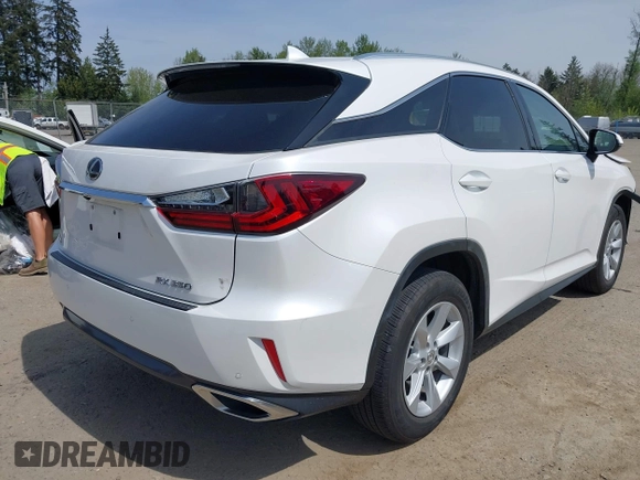 2017 Lexus RX with VIN 2T2BZMCA7HC118019, listed as a IAAI auction lot 42128499 with 100,448 mi miles. Bid and sale history available at carsss.com. Image 4.
