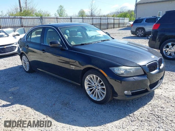 2011 BMW 3 Series 335i xDrive with VIN WBAPL5G50BNN23199, listed as a IAAI auction lot 42041719 with 205,807 mi miles. Bid and sale history available at carsss.com. Image 1.