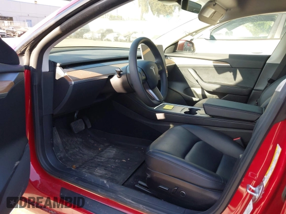 2022 Tesla Model 3 Long Range with VIN 5YJ3E1EB3NF273540, listed as a IAAI auction lot 41978069 with 27,247 mi miles and . Bid and sale history available at DreamBid. Image 21.