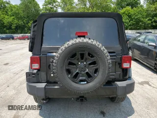 2015 Jeep Wrangler Freedom Edition with VIN 1C4AJWAG8FL688255, listed as a Copart auction lot 59722165 with 130,666 mi miles and Salvage title. Bid and sale history available at DreamBid. Image 6.