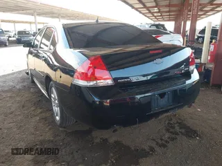 2014 Chevrolet Impala LT with VIN 2G1WB5E34E1158088, listed as a IAAI auction lot 42417592 with 92,995 mi miles and . Bid and sale history available at DreamBid. Image 3.