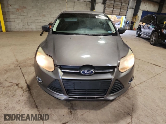 2012 Ford Focus SE with VIN 1FAHP3F28CL208855, listed as a Copart auction lot 63766165 with 168,183 mi miles and Salvage title. Bid and sale history available at DreamBid. Image 5.
