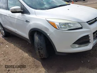 2013 Ford Escape SEL with VIN 1FMCU9HX6DUB14053, listed as a IAAI auction lot 42361297 with 144,861 mi miles and . Bid and sale history available at DreamBid. Image 6.