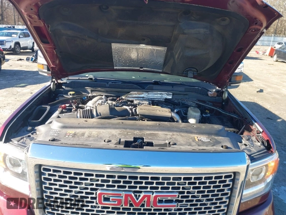2017 GMC Sierra 2500HD Denali z VIN 1GT12UEY0HF186720, wystawiony jako IAAI lot #41580466 z przebiegiem Nie podano mil oraz . Historia ofert i sprzedaży dostępna na DreamBid. Obrazek 10.