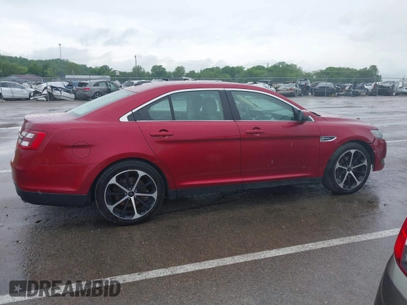 2014 Ford Taurus SEL z VIN 1FAHP2E83EG125622, wystawiony jako IAAI lot #42204238 z przebiegiem 134 032 mil mil oraz . Historia ofert i sprzedaży dostępna na DreamBid. Obrazek 14.