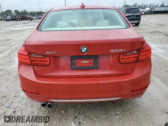 2014 BMW 3 Series 328i xDrive with VIN WBA3B3C59EJ977670, listed as a Copart auction lot 61997165 with 128,937 mi miles and Salvage title. Bid and sale history available at DreamBid. Image 6.