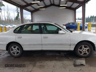 1998 Toyota Avalon XL with VIN 4T1BF18B5WU242038, listed as a IAAI auction lot 41577342 with 195,707 mi miles and . Bid and sale history available at DreamBid. Image 13.