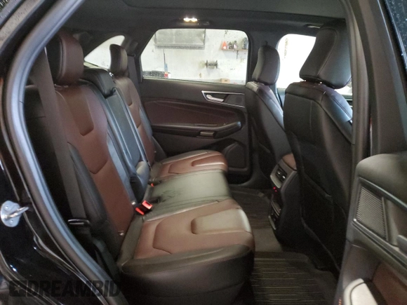 2021 Ford Edge Titanium z VIN 2FMPK4K90MBA39604, wystawiony jako Copart lot #55942265 z przebiegiem 28 117 mil mil oraz Nie do naprawy • Non repairable. Historia ofert i sprzedaży dostępna na DreamBid. Obrazek 11.