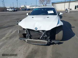 2011 BMW M3 with VIN WBSKG9C57BE646148, listed as a IAAI auction lot 41559675 with 90,333 mi miles. Bid and sale history available at carsss.com. Image 6.