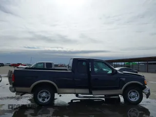 2000 Ford F-150 XL with VIN 1FTRX17L2YNB85627, listed as a IAAI auction lot 41377814 with 123,740 mi miles. Bid and sale history available at carsss.com. Image 14.