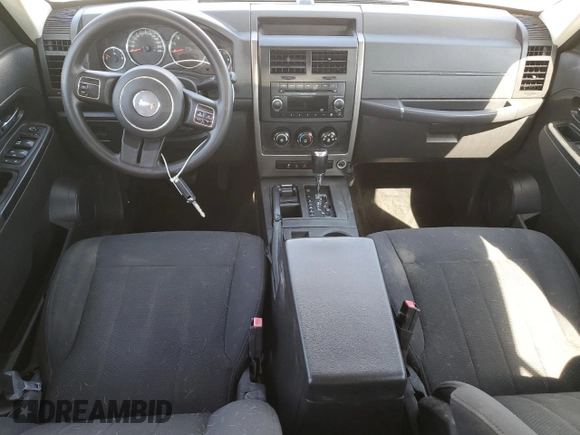 2012 Jeep Liberty Sport Latitude z VIN 1C4PJMAK6CW106120, wystawiony jako Copart lot #51434905 z przebiegiem 197 080 mil mil oraz Czysty tytuł • Clean title. Historia ofert i sprzedaży dostępna na DreamBid. Obrazek 8.
