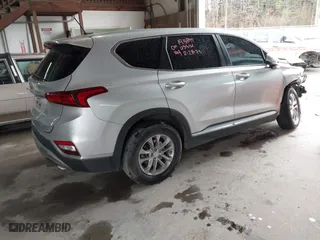 2019 Hyundai Santa Fe SE with VIN 5NMS23AD9KH035161, listed as a IAAI auction lot 41757044 with 124,835 mi miles. Bid and sale history available at carsss.com. Image 4.