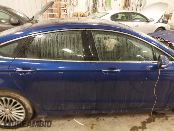 2013 Ford Fusion Titanium Hybrid with VIN 3FA6P0RU9DR320909, listed as a IAAI auction lot 41477530 with 108,153 mi miles. Bid and sale history available at carsss.com. Image 13.