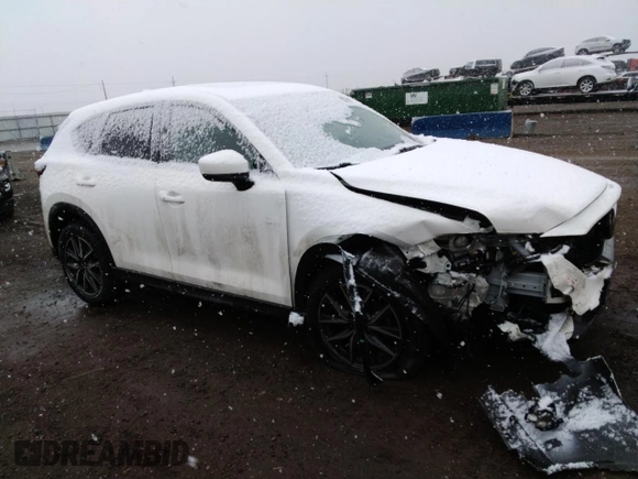 2018 Mazda CX-5 Grand Touring with VIN JM3KFBDM2J0405902, listed as a Copart auction lot 53731175 with 85,740 mi miles and Salvage Title. Bid and sale history available at DreamBid. Image 4.