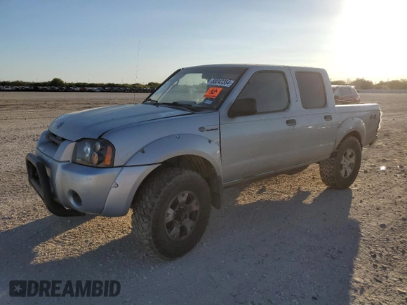 2003 Nissan Frontier SVE with VIN 1N6MD27Y43C432877, listed as a Copart auction lot 80243354 with Not provided miles and Salvage title. Bid and sale history available at DreamBid. Image 1.