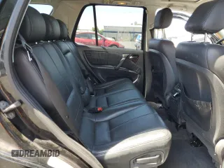 2000 Mercedes-Benz M 320/430/500 with VIN 4JGAB72EXYA193906, listed as a Copart auction lot 62025125 with 142,808 mi miles and Salvage title. Bid and sale history available at DreamBid. Image 11.