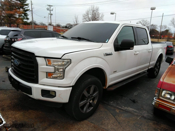 2015 Ford F-150 XLT w/HD Payload Pkg with VIN 1FTFW1EG8FFA12438, listed as a IAAI auction lot 41743982 with 174,799 mi miles. Bid and sale history available at carsss.com. Image 2.
