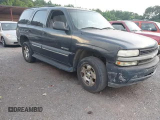 2003 Chevrolet Tahoe LS z VIN 1GNEC13V93R194447, wystawiony jako IAAI lot #42410764 z przebiegiem 304 614 mil mil oraz . Historia ofert i sprzedaży dostępna na DreamBid. Obrazek 1.
