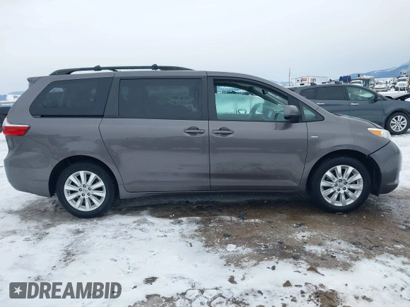2016 Toyota Sienna LE with VIN 5TDJK3DC6GS142669, listed as a IAAI auction lot 41436771 with 135,715 mi miles. Bid and sale history available at carsss.com. Image 13.