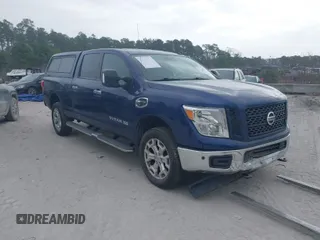 2019 Nissan Titan XD SV with VIN 1N6BA1F49KN506712, listed as a IAAI auction lot 41661789 with 107,972 mi miles. Bid and sale history available at carsss.com. Image 1.