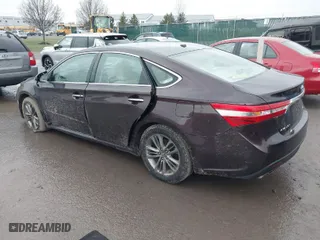 2014 Toyota Avalon Limited with VIN 4T1BK1EB4EU124593, listed as a IAAI auction lot 41064543 with 267,959 mi miles. Bid and sale history available at carsss.com. Image 3.