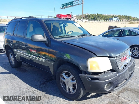 2006 GMC Envoy SLT with VIN 1GKDS13S962184712, listed as a IAAI auction lot 41250740 with 226,986 mi miles. Bid and sale history available at carsss.com. Image 1.