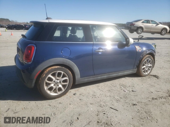 2014 MINI Hardtop with VIN WMWXM5C56ET972955, listed as a Copart auction lot 48160225 with 60,692 mi miles and Clean Title. Bid and sale history available at DreamBid. Image 3.