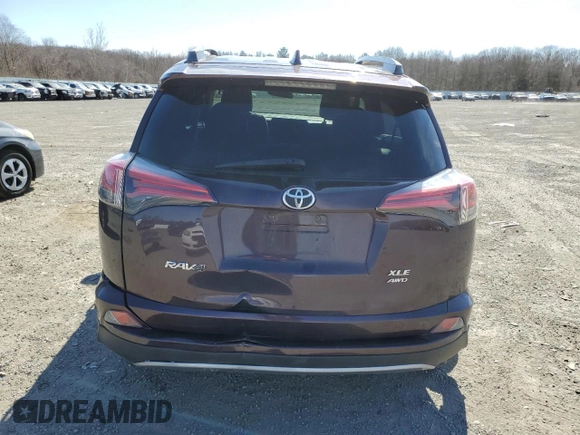 2018 Toyota RAV4 XLE with VIN 2T3RFREVXJW851654, listed as a Copart auction lot 48961055 with 166,664 mi miles and Salvage Title. Bid and sale history available at DreamBid. Image 6.