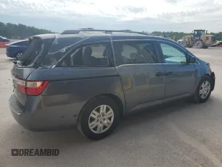 2012 Honda Odyssey LX с VIN 5FNRL5H21CB009359, выставлен на аукционе Copart как лот 57669225 с пробегом 162 757 миль миль и Списание • Salvage title. История ставок и продаж доступна на DreamBid. Изображение 3.