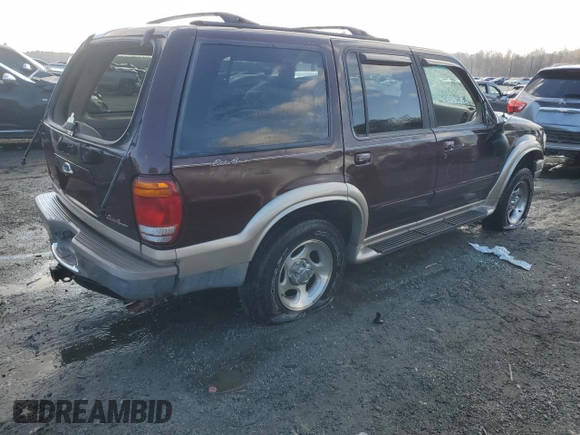 2000 Ford Explorer Eddie Bauer z VIN 1FMZU74E6YUB37521, wystawiony jako Copart lot #85994294 z przebiegiem 126 348 mil mil oraz Szkoda całkowita • Salvage title. Historia ofert i sprzedaży dostępna na DreamBid. Obrazek 3.
