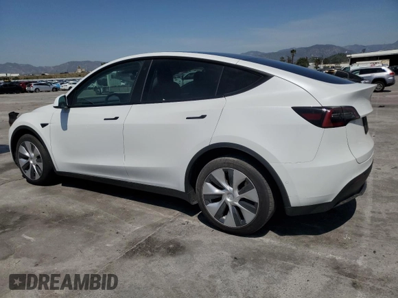 2022 Tesla Model Y Long Range z VIN 7SAYGDEE2NF513823, wystawiony jako Copart lot #51174795 z przebiegiem 28 143 mil mil oraz Szkody całkowita. Historia ofert i sprzedaży dostępna na DreamBid. Obrazek 2.