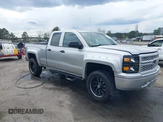 2014 Chevrolet Silverado 1500 Work Truck with VIN 1GCVKPEHXEZ210955, listed as a IAAI auction lot 41843645 with 267,582 mi miles and . Bid and sale history available at DreamBid. Image 1.