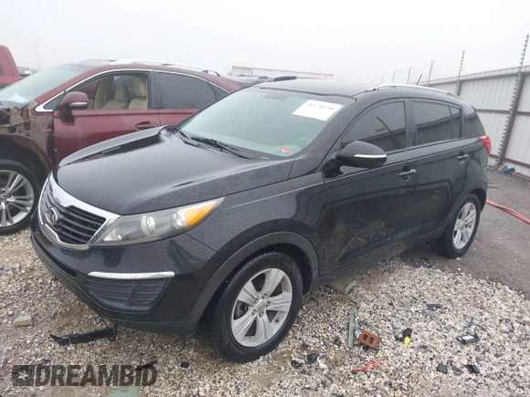 2011 Kia Sportage LX with VIN KNDPB3A25B7027733, listed as a IAAI auction lot 38570270 with 186,271 mi miles and . Bid and sale history available at carsss.com. Image 2.