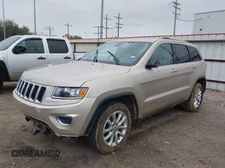 2014 Jeep Grand Cherokee Laredo with VIN 1C4RJEAG5EC424244, listed as a IAAI auction lot 41608821 with 156,251 mi miles and . Bid and sale history available at DreamBid. Image 2.