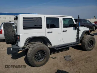 2015 Jeep Wrangler Unlimited Rubicon with VIN 1C4BJWFG1FL750561, listed as a Copart auction lot 60797075 with 95,677 mi miles and Salvage title. Bid and sale history available at DreamBid. Image 3.