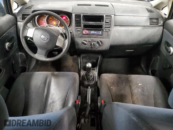 2009 Nissan Versa 1.6 with VIN 3N1CC11E49L458857, listed as a Copart auction lot 59195275 with 100,351 mi miles and Salvage title. Bid and sale history available at DreamBid. Image 8.