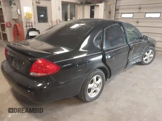 2004 Ford Taurus SE z VIN 1FAFP53U74G107504, wystawiony jako IAAI lot #42068692 z przebiegiem Nie podano mil oraz . Historia ofert i sprzedaży dostępna na DreamBid. Obrazek 4.